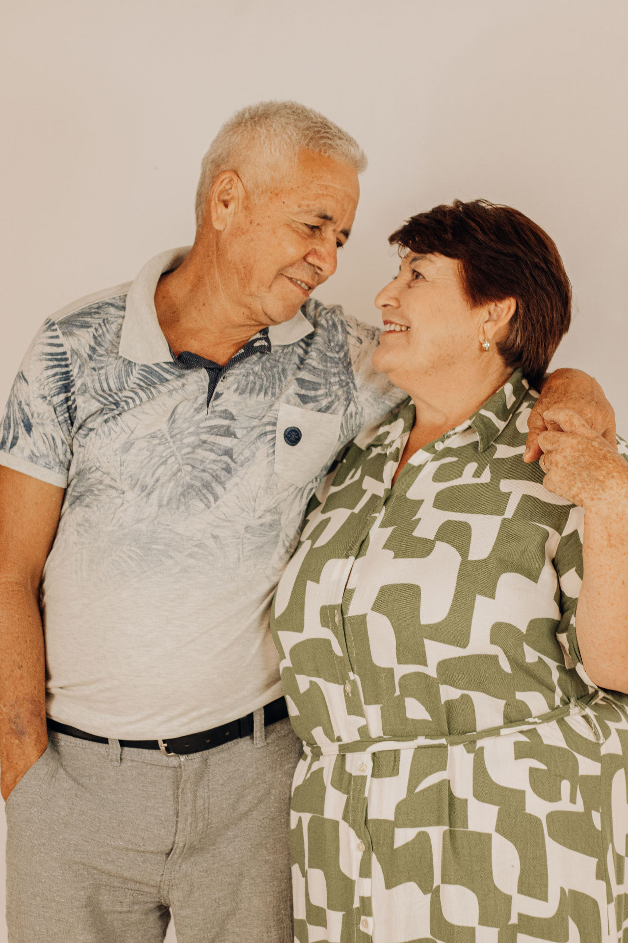 An older couple smiling at each other — the kind of moment Harbor Lane protects.
