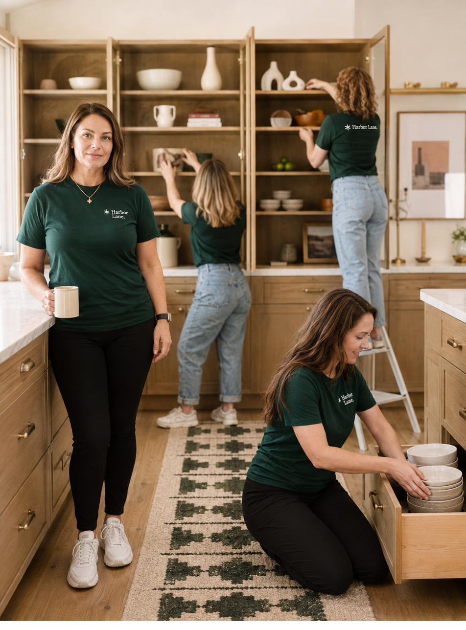 Harbor Lane team members sorting and organizing a client's kitchen.